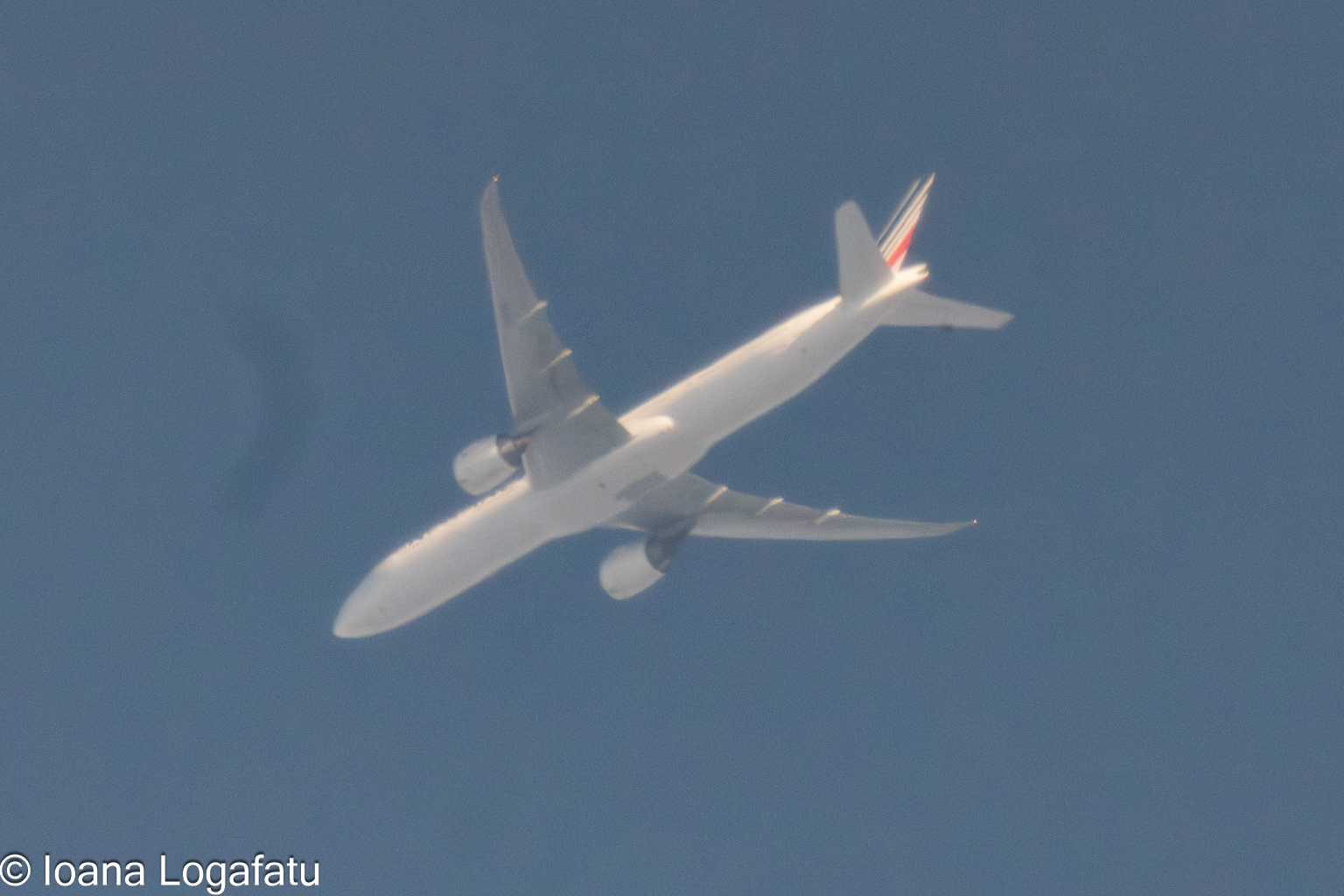 Majestic airliner gliding through the clear sky